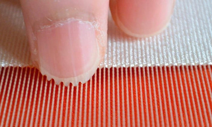 1000-year-old Japanese weaving technique called &quot;tsumegaki tsuzume-ori&quot; where weavers cut their nails to produce highly intricate designs.