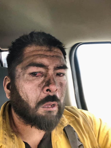 A firefighter from Washington state after battling the wildfire