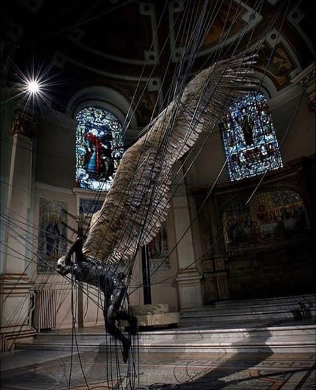 Statue of Lucifer in Holy Trinity Church, Marylebone, Westminster, London.