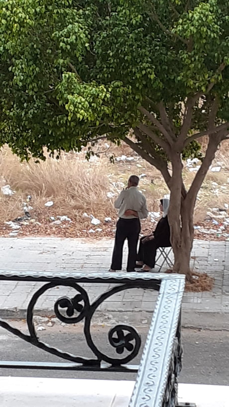 This man was walking with his wife, holding a foldable chair and he&#039;d stop when she gets tired to put the chair down and wait for her to rest.