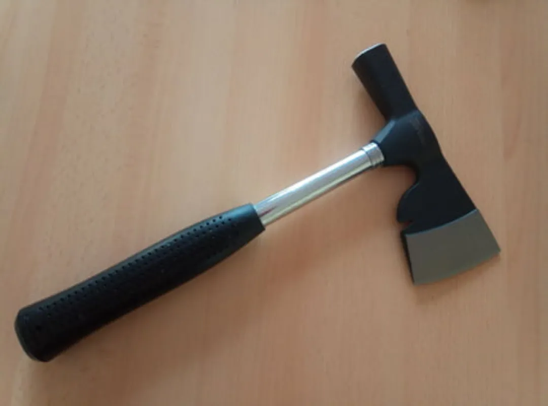 Today I went to the store to buy a chair. I ended up with this. I'm not a lumberjack. I don't own a garden, neither live in country. I didn't even need an axe. I have a simple deskjob... And I have no regrets.